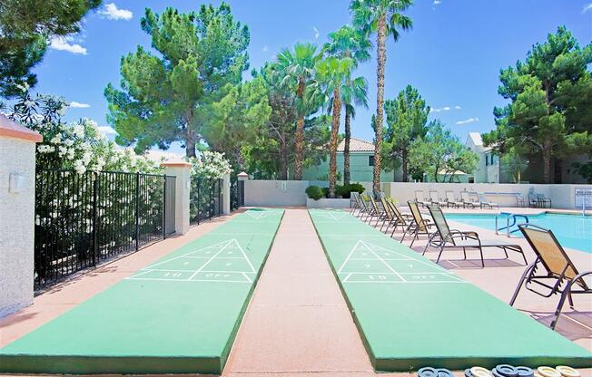 Shuffleboard poolside at Country Club at Valley View Senior Apartments in Las Vegas, NV, For Rent. Now leasing 1 and 2 bedroom apartments.