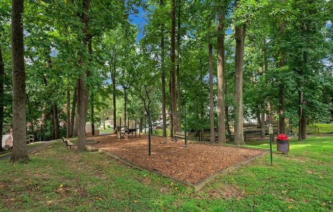 a picnic area in a park with trees