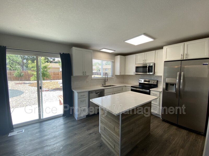 9371 BELLAIRE DR