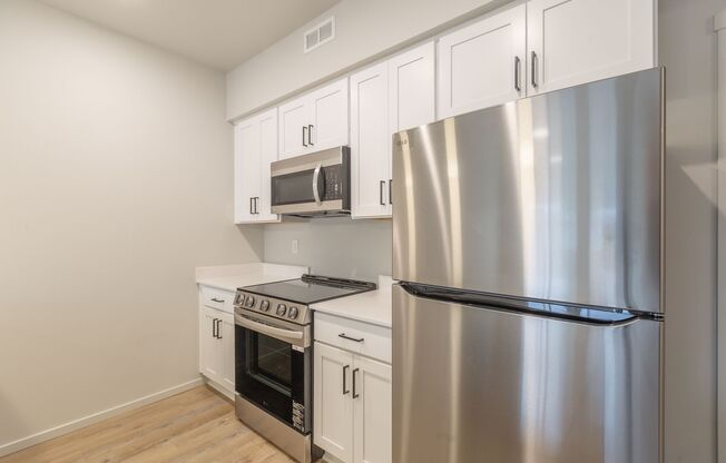 2 beds, 1.5 baths, 921 sqft, $1,795, Unit 103