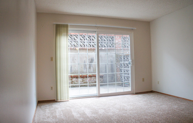 Check Out This NE 1 Bed & Enjoy Your Own Private Patio!