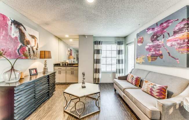 a living room with a couch and a coffee table