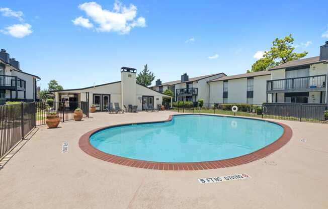 the preserve at ballantyne commons community swimming pool with apartment buildings