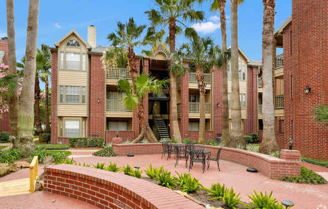 our apartments offer a courtyard with tables and chairs