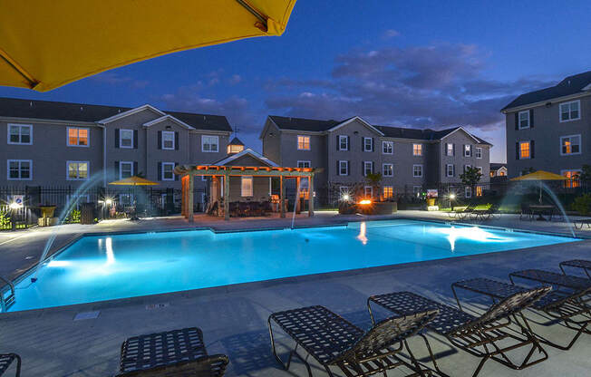 Outdoor Pool and Sundeck at Night