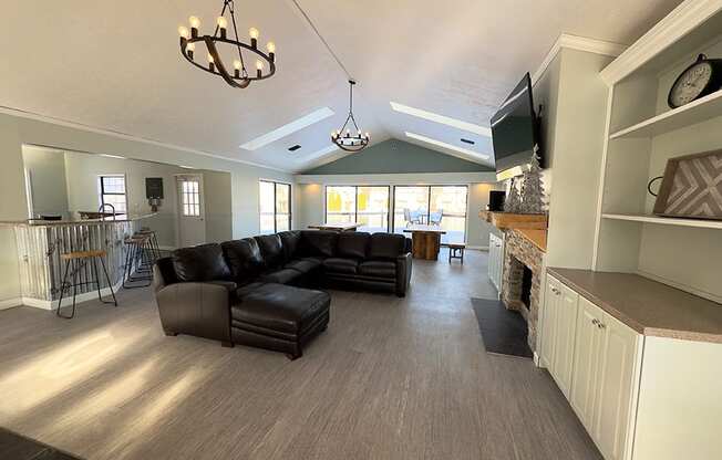 lounge area with sofa and tv at old farm shores apartments