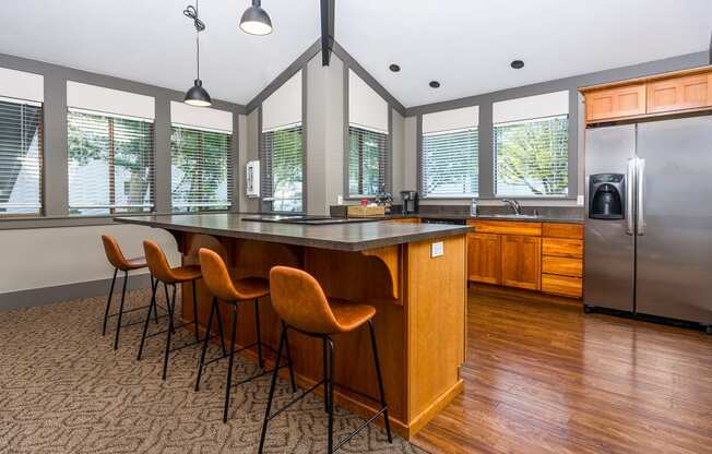 a kitchen with a large island with a breakfast Copper Ridge Apartments, Renton, 98055