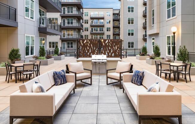 Enjoy open-air gatherings at Modera Liberty Row with stylish courtyard seating and grilling stations, just steps from Uptown Charlotte.