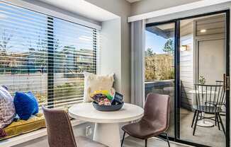 a living room with a table with a bowl of food on it