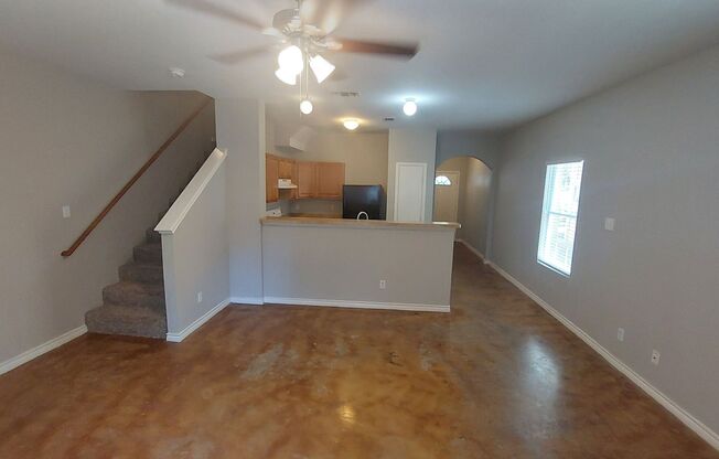 3 bdrm 2.5 Bath~Beautiful townhouse with stained concrete flooring downstairs! Rare End Unit