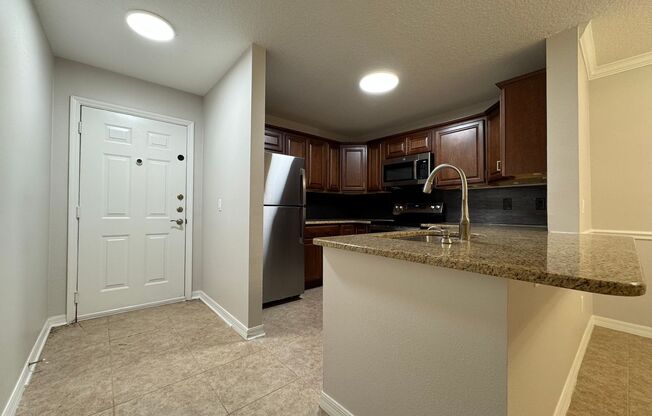 Oviedo 2/2 Condo with Tile & LVP Flooring, Updated Baths, New Paint & Appliances!