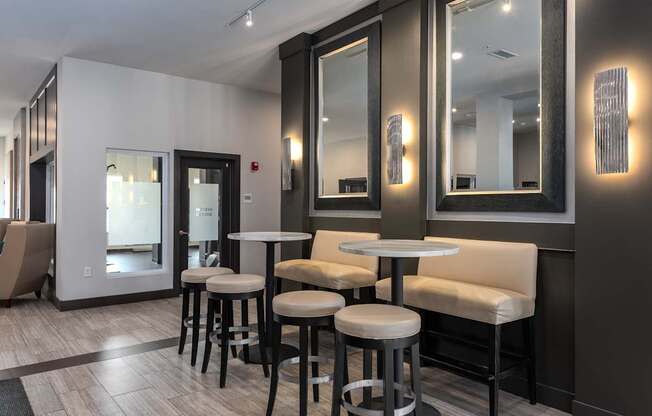 A modern bar area with a black and white color scheme.