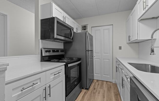the preserve at ballantyne commons apartment kitchen with stainless steel appliances