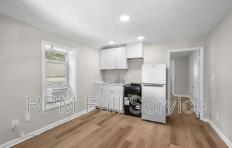 325 54 AVE N