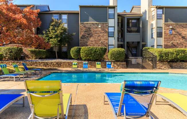 Outdoor pool area  at The Summit Apartments in Mesquite, Texas, TX