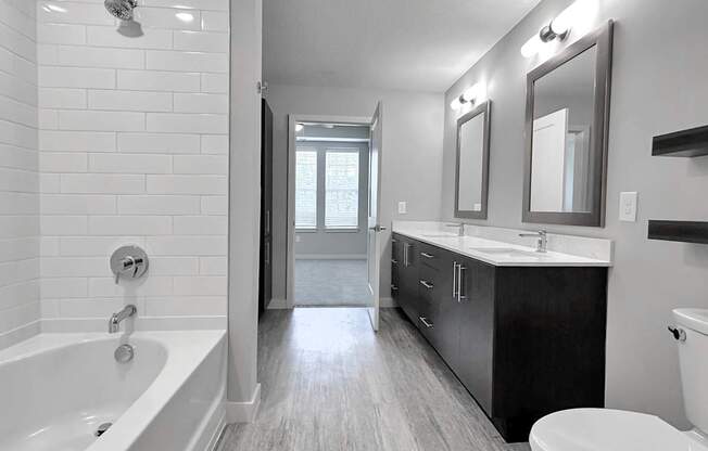 Garden soaking tubs with curved shower rods and tub to ceiling tile backsplash