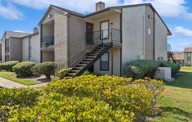 A house with a staircase leading to the second floor.