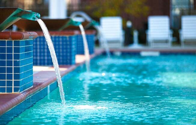 water features pour into the pool at 1200 Acqua