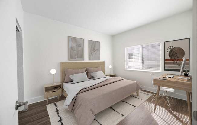 an image of a bedroom with a bed and a desk