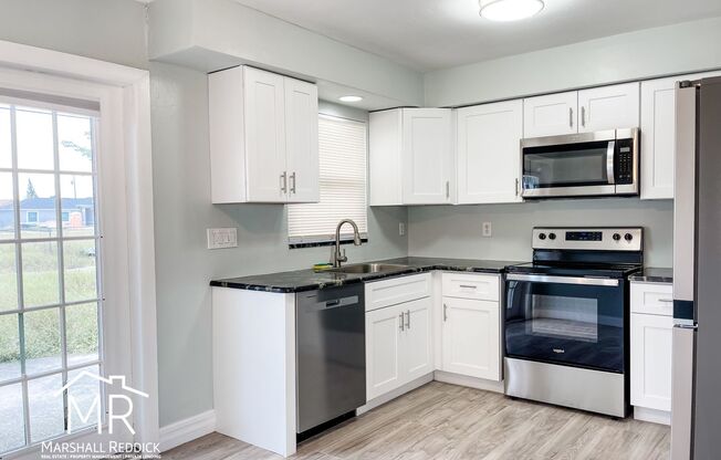 Charming 2 Bed 1 Bath Duplex in NE Cape