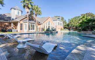 Apartments in Houston, TX for Rent – Gramercy Park - Resort Style pool with in the water lounge chairs