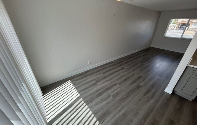 BEAUTIFULLY UPDATED HOME FEATURES 3 BEDROOM AND 1 BATH BRAND-NEW LUXURY VINYL PLANK FLOORING THROUGHOUT