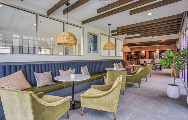the lobby of a restaurant with couches and chairs at Presidium Revelstoke, Fort Worth, TX, 76131