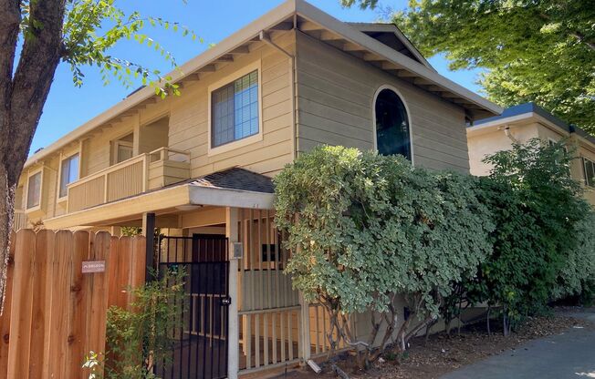 Updated Midtown 2 Bedroom Townhouse in Gated Community with Off-Street Parking