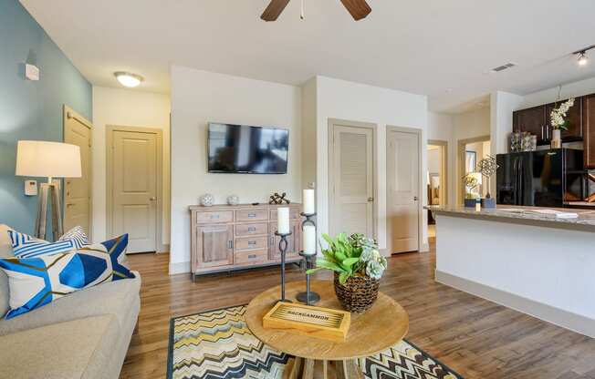 a living room with a couch and a coffee table at Alvista Round Rock, Round Rock, TX