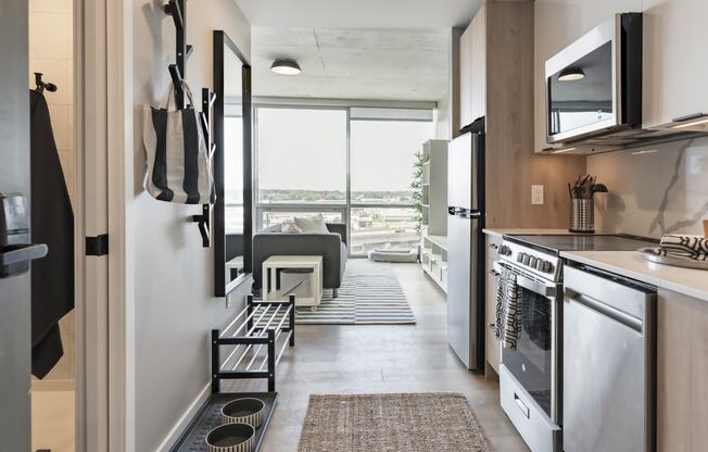 a kitchen and living room in a tiny houseat One Foundry Way, Missouri, 63110