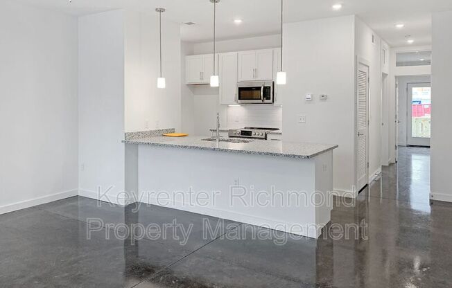 114 W 12 ST 
