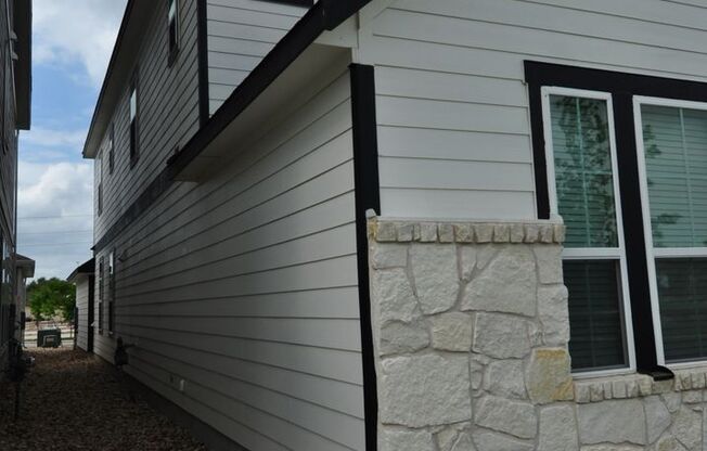 Enjoy a lock and leave lifestyle in this brand new cottage style home at The Retreat at Hero Way