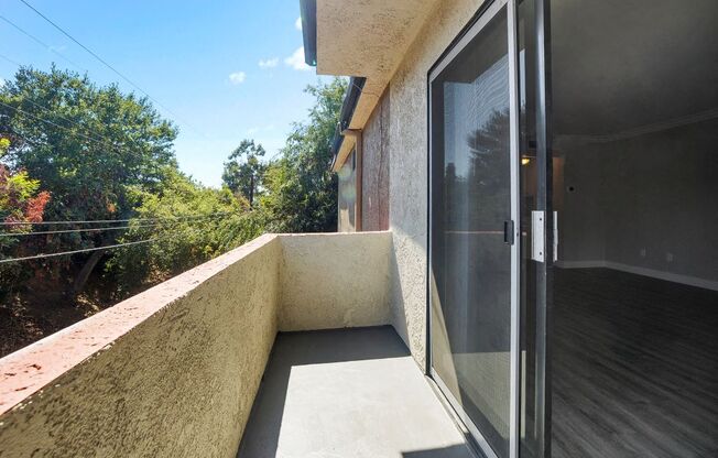 Sherman Oaks, CA Apartments for Rent- Brody Terrace- Sliding Window Door to Patio with Street View