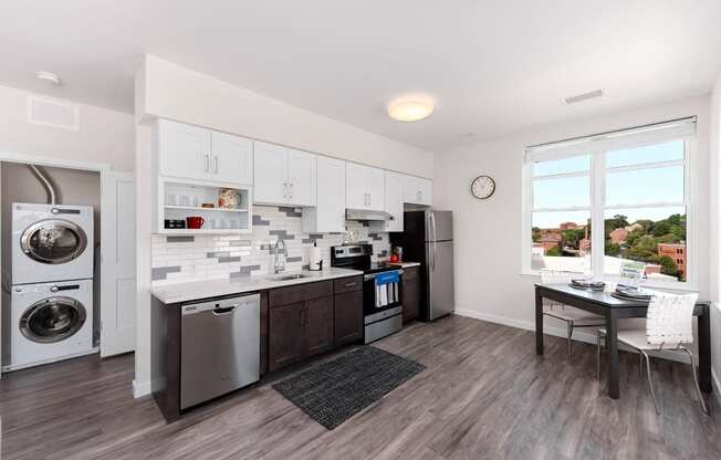 Studio apartment with open kitchen and washer and dryer