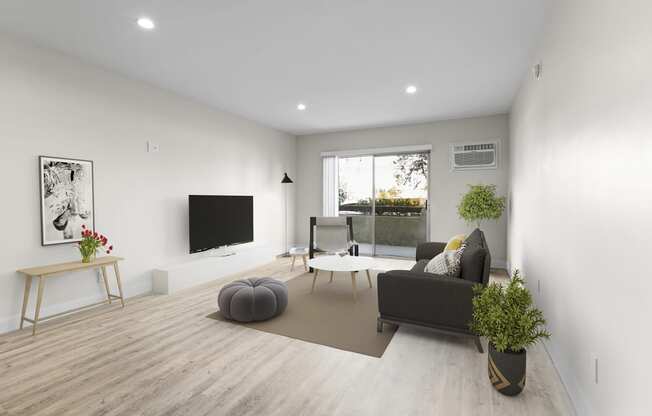 a living room with a couch and a table and a television