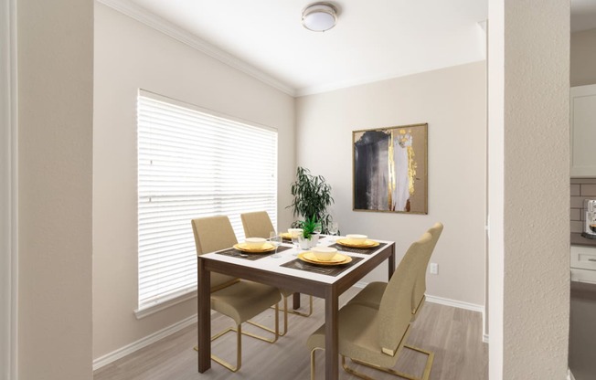 this is a photo of the dining room in a 2 bedroom apartment at deer hill apartments in