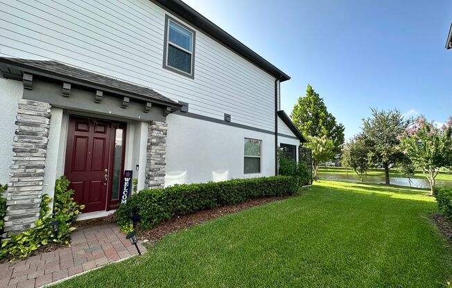 Lease this 3BR End-Unit Townhome in Gated Community with Water View!