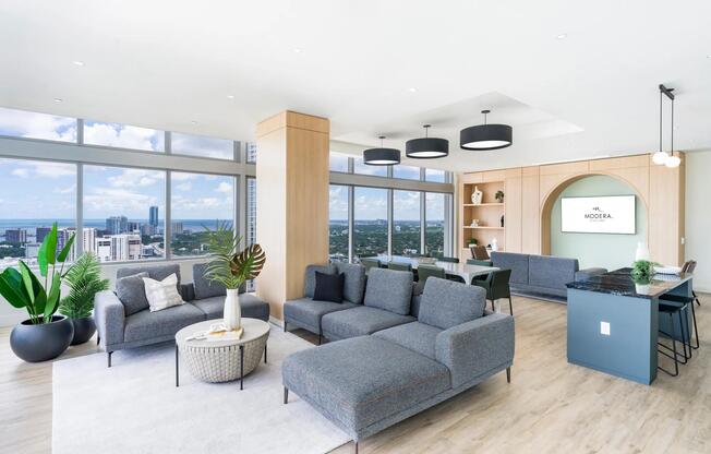 Host, relax, and take in sweeping views from Modera Riverside’s 36th floor resident lounge.