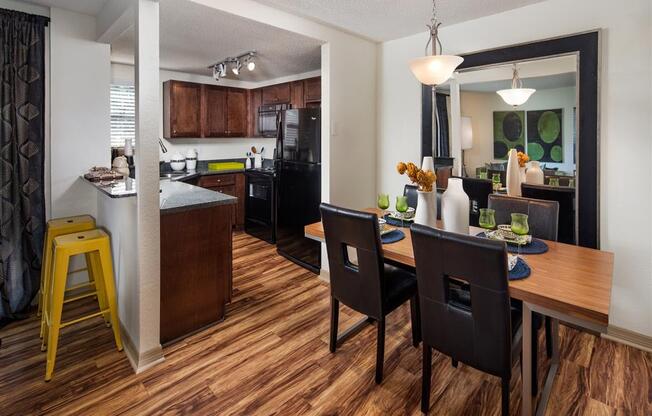 Dining area off the kitchen and a breakfast bar at Creekfront at Deerwood, Jacksonville