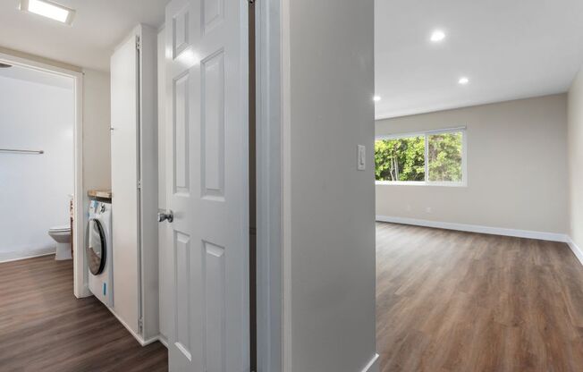 a laundry room with a washer and dryer