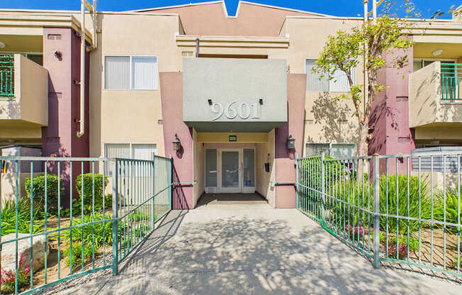 The image shows the front of a building with the number 9601 on it.
