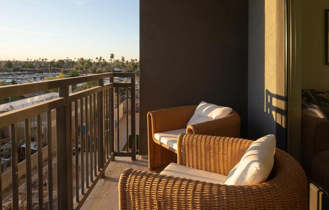 A private balcony retreat with sunset views—your own outdoor escape above the city.