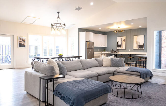 a living room with a large couch and two tables at Sunset Canyon, Texas