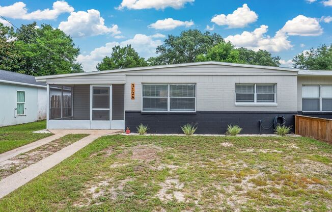 Renovated 3-Bedroom Duplex with Large Fenced Backyard