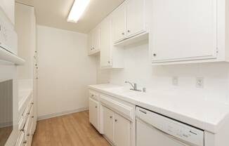 Kitchen with White Appliances and White Cabinets