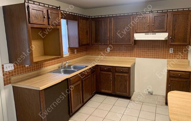 9724 WILLIAMSBURG DR