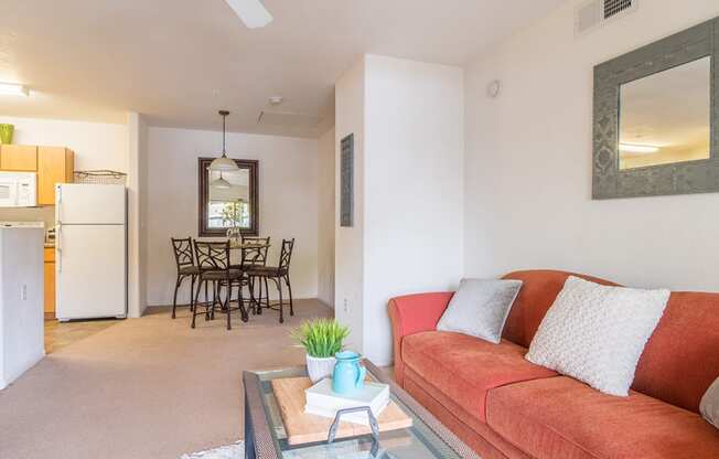 Desert Sands living room with carpet flooring. 