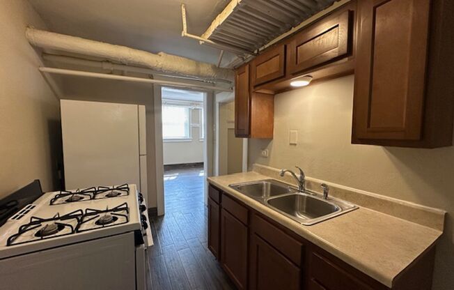 Freshly Renovated 2BR Garden Apartment Near UWM $1,350/mo – Heat + Parking Included