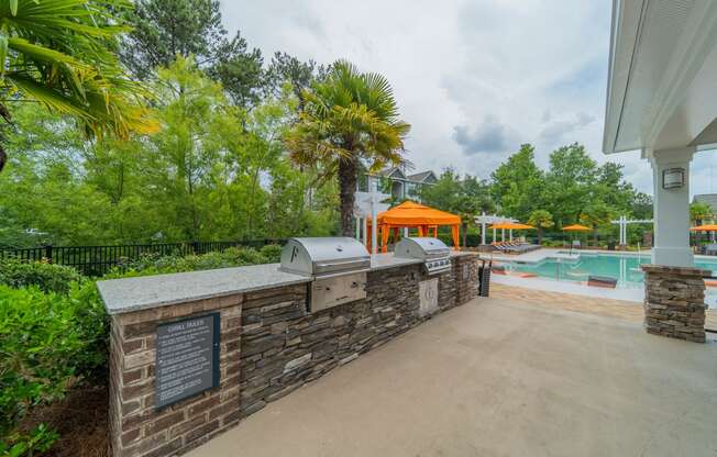 the preserve at ballantyne commons concierge desk and pool area with trees