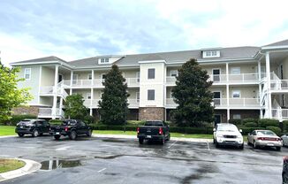 First Floor, 2 Bedroom, 2 Bath Condo with Screened Patio! Community Pool!